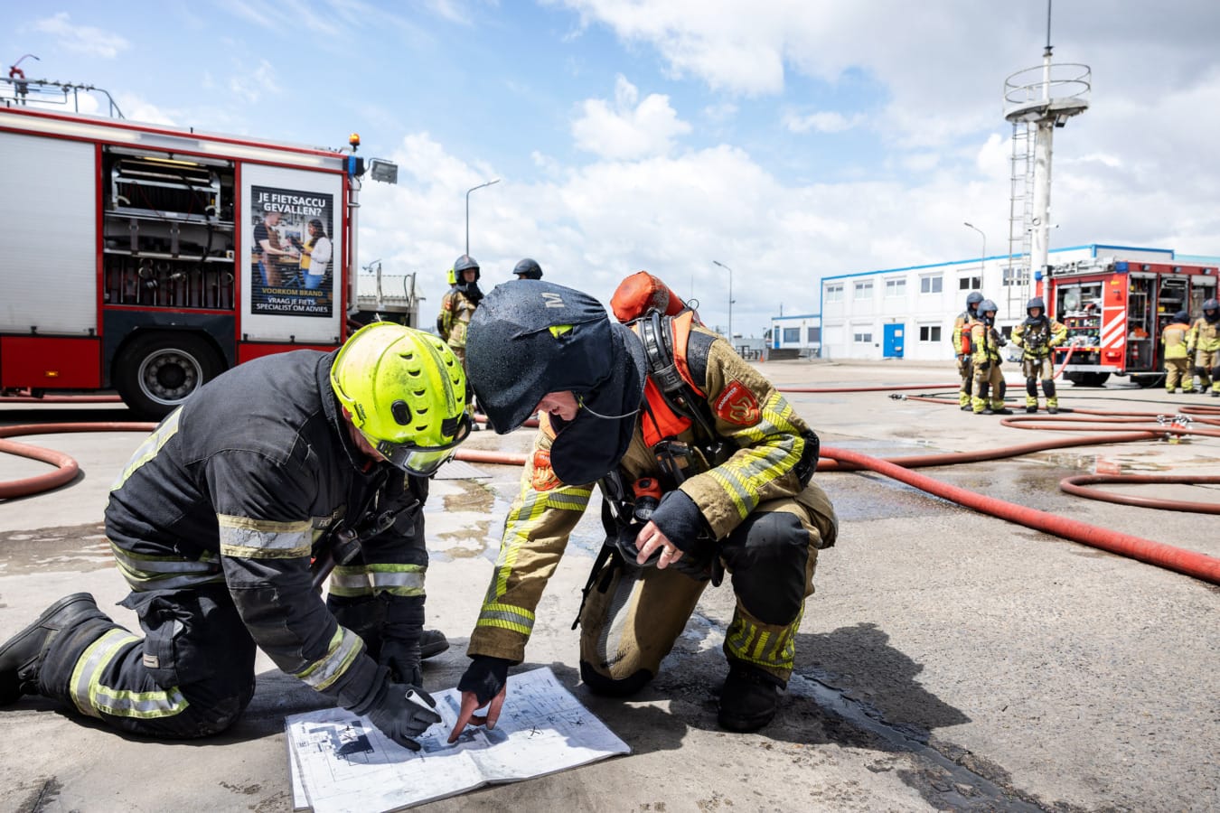 Overleg brandweermannen